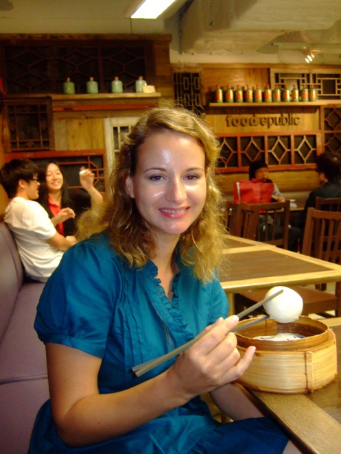 Susan eating Dim Sum in her new dress